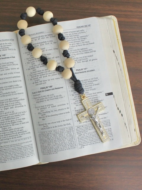 Handmade one decade door rosary by Knots of Grace, Light of Faith St. Benedict Door Rosary, navy (pictured on bible)