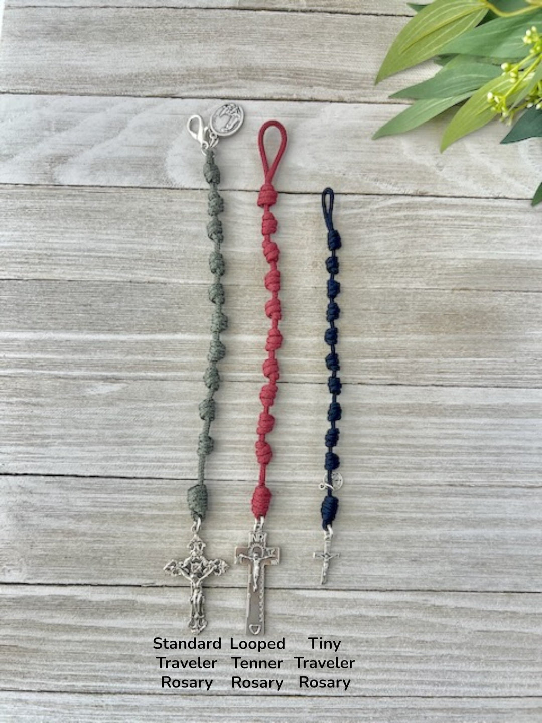 Flat lay comparison of Knots of Grace handmade one-decade traveler pocket rosaries showing different lengths and styles