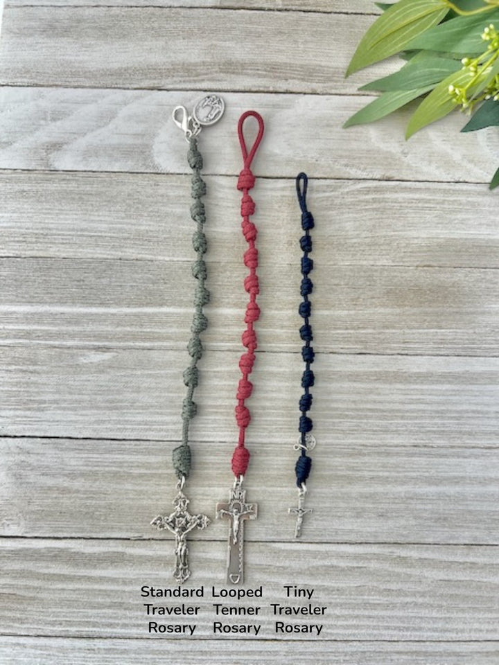 Flat lay comparison of Knots of Grace handmade one-decade traveler pocket rosaries showing different lengths and styles