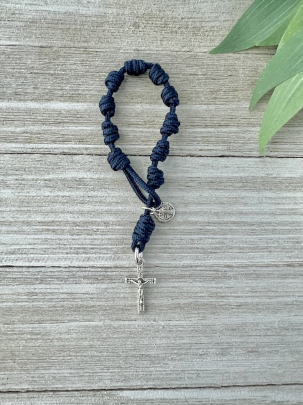 Navy blue one-decade Catholic pocket rosary with knotted cord, silver-tone cross and medal, handmade by Knots of Grace